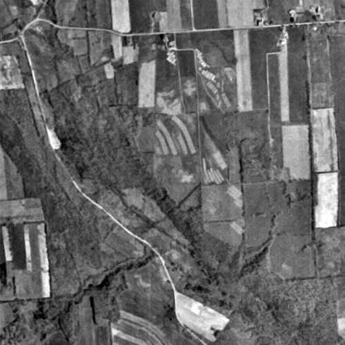 Aerial view of USDA Soil Management Research Farm and Gully Road properties, April 16, 1957.  USGS.